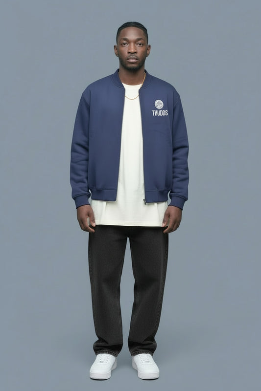 Full body view of the model wearing Thudds Zip-Up Fleeced Varsity Jacket